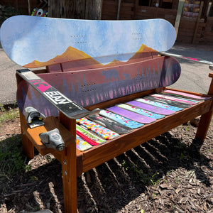Hand Painted Frontier Bench full size chair build with bear and cub forest scene on reclaimed snowboard backrest, colorful mixed ski seat, and ski armrests on a wood frame