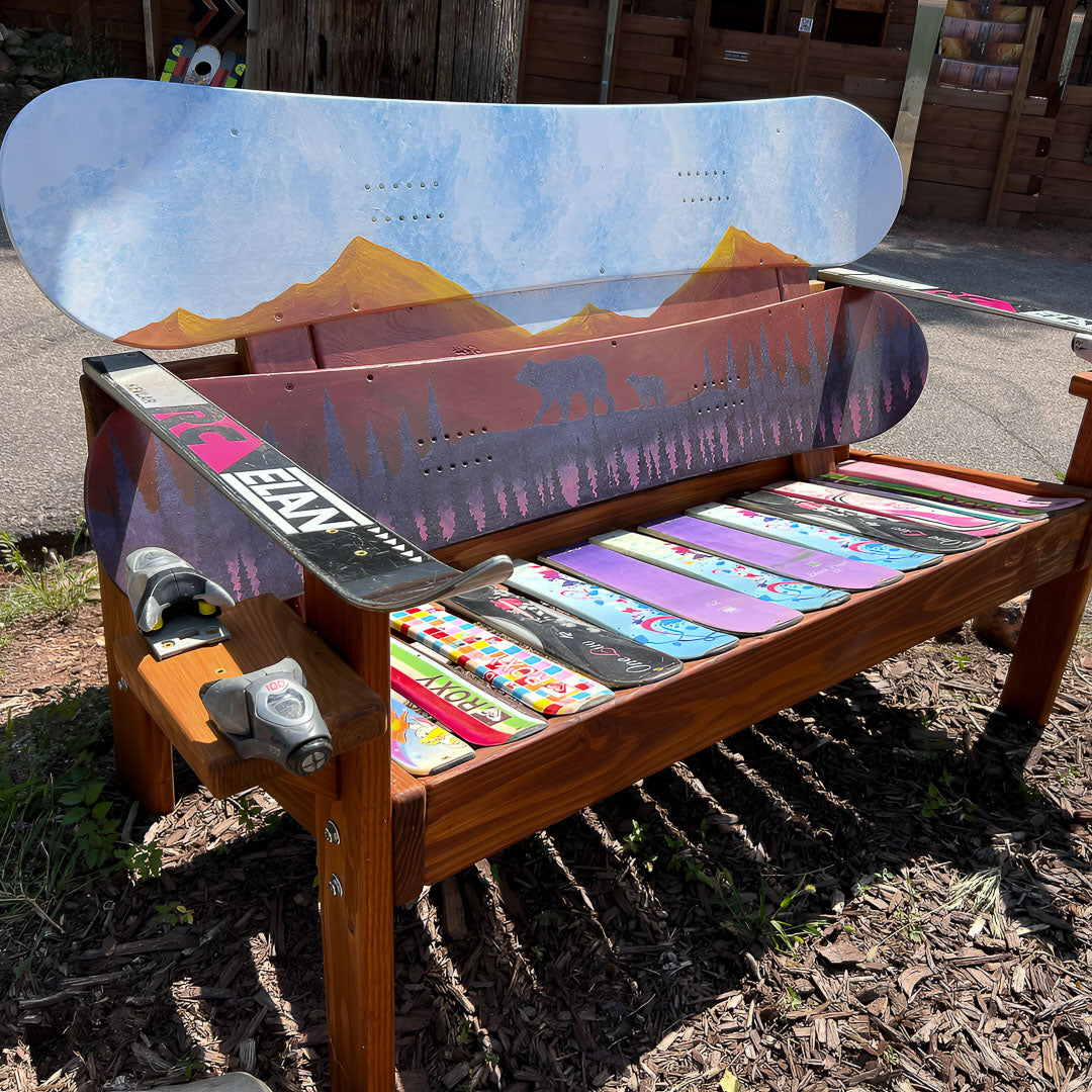 Hand Painted Frontier Bench full size chair build with bear and cub forest scene on reclaimed snowboard backrest, colorful mixed ski seat, and ski armrests on a wood frame