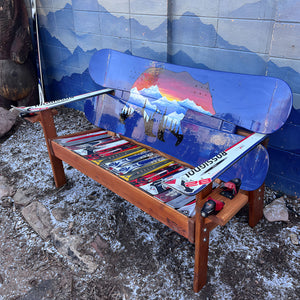 Hand Painted Frontier Bench full size chair build with bear and mountain sunset scene on blue reclaimed snowboard backrest, mixed ski seat, and ski armrests on a wood frame